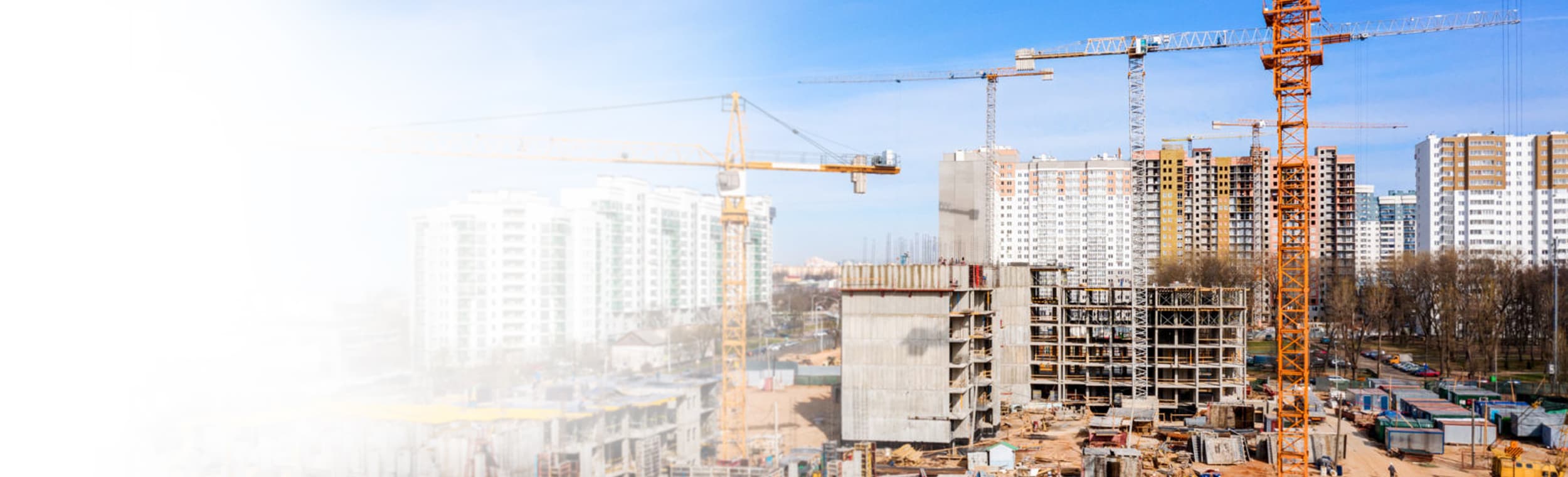 Construction cranes on a site 1200x799